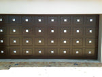 Garage door with square pyramid cap decor hardware / clavos