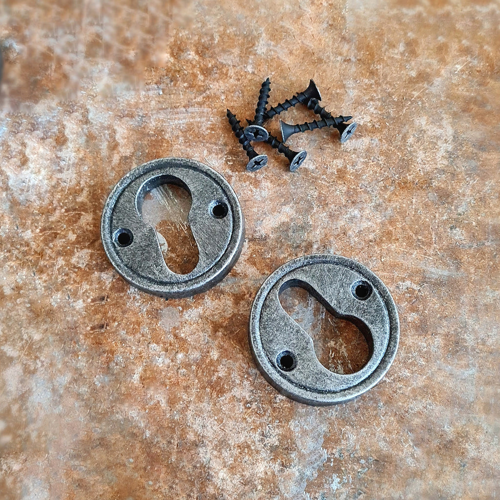 Escutcheon lock plate