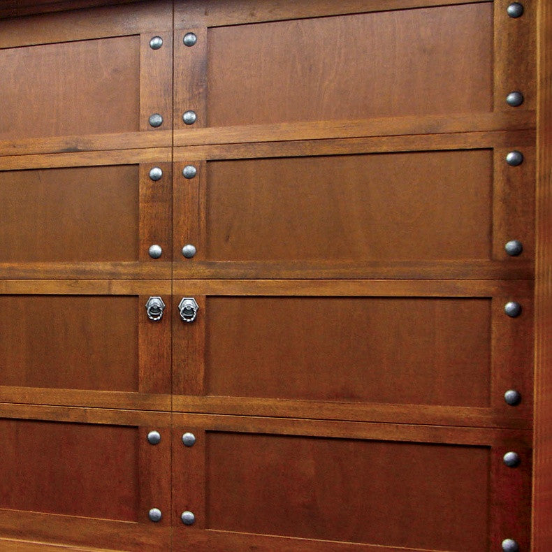 Single garage door featuring NW/AC4 mock knockers and NW/93DD 50 mm diameter round studs