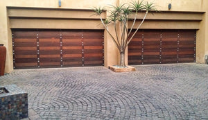 Two double doors side by side featuring NW/93DD CH chrome 50 mm diameter round studs.
