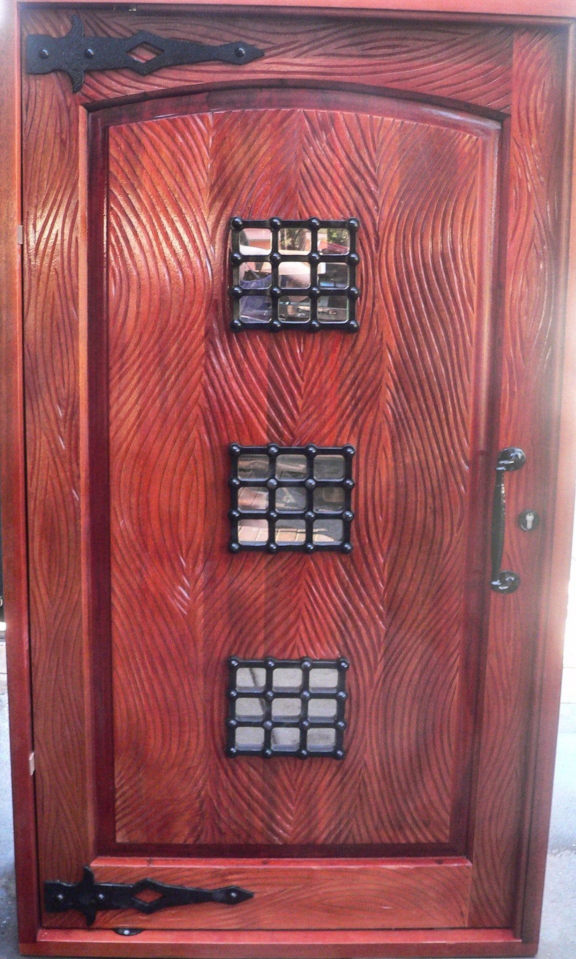 Pivot front door featuring NW/AC32 door grille and NW/AC8 mock hinges. 