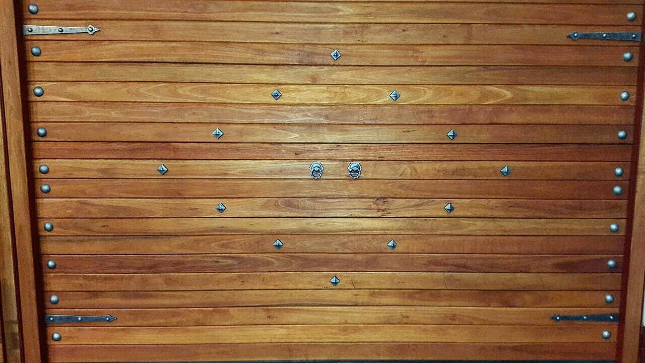 Custom design door by the Noweld team featuring NW/AC10 mock hinges, NW/AC4 mock knockers, NW/34DD round half caps and NW/48DD square pyramid caps. 