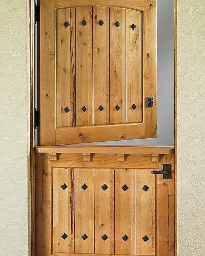 Farm style door featuring NW/66DD rivet head studs