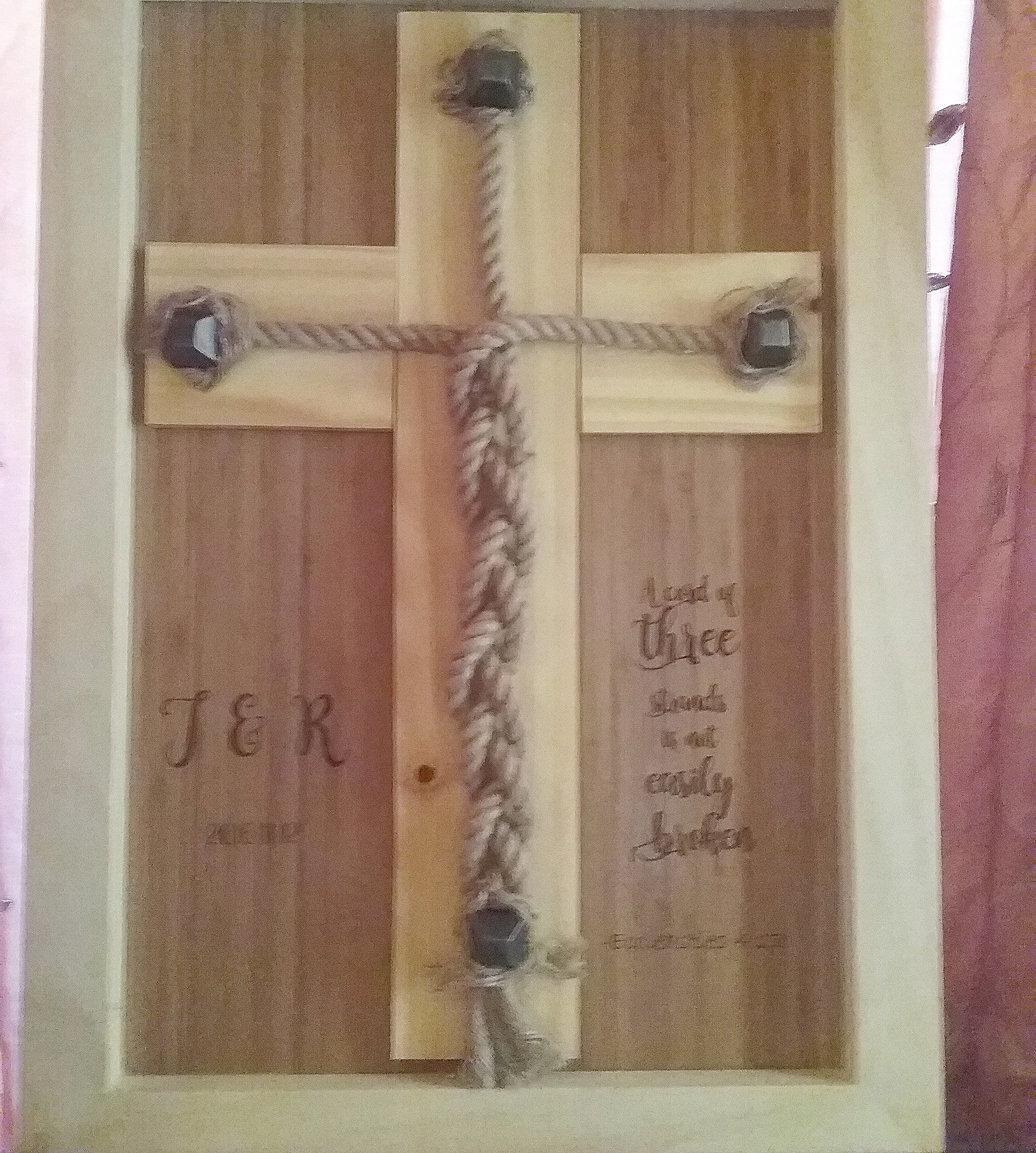 Home decor cross with decorative studs to give it an authentic look and feel