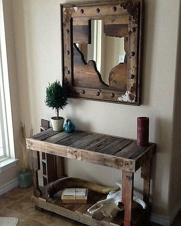 Recycled pallet wood mirror frame customised with decoractive studs