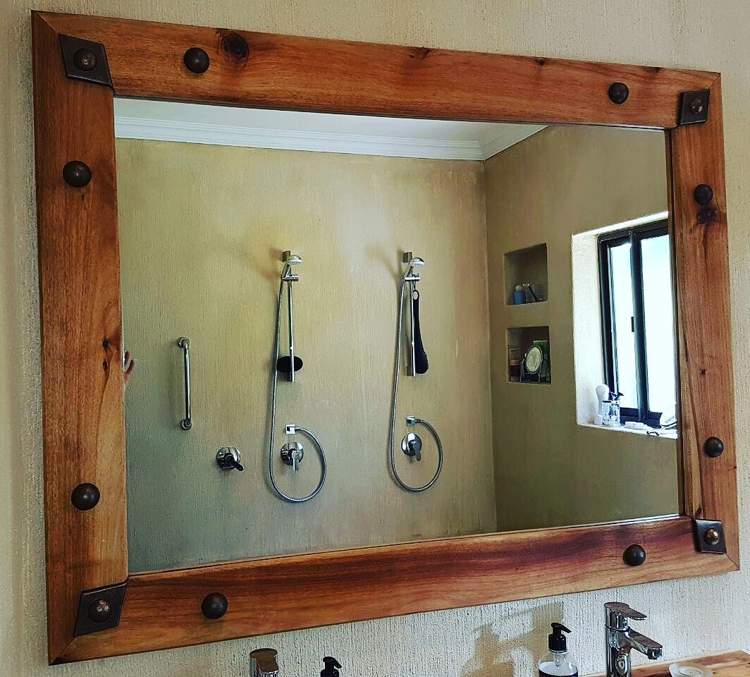 Stylish bathroom mirror with resin decor studs. Rustproof, lightweight and most importantly, maintenance free. 