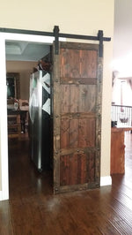 Barn style sliding door with NW/34DD half round decor studs 